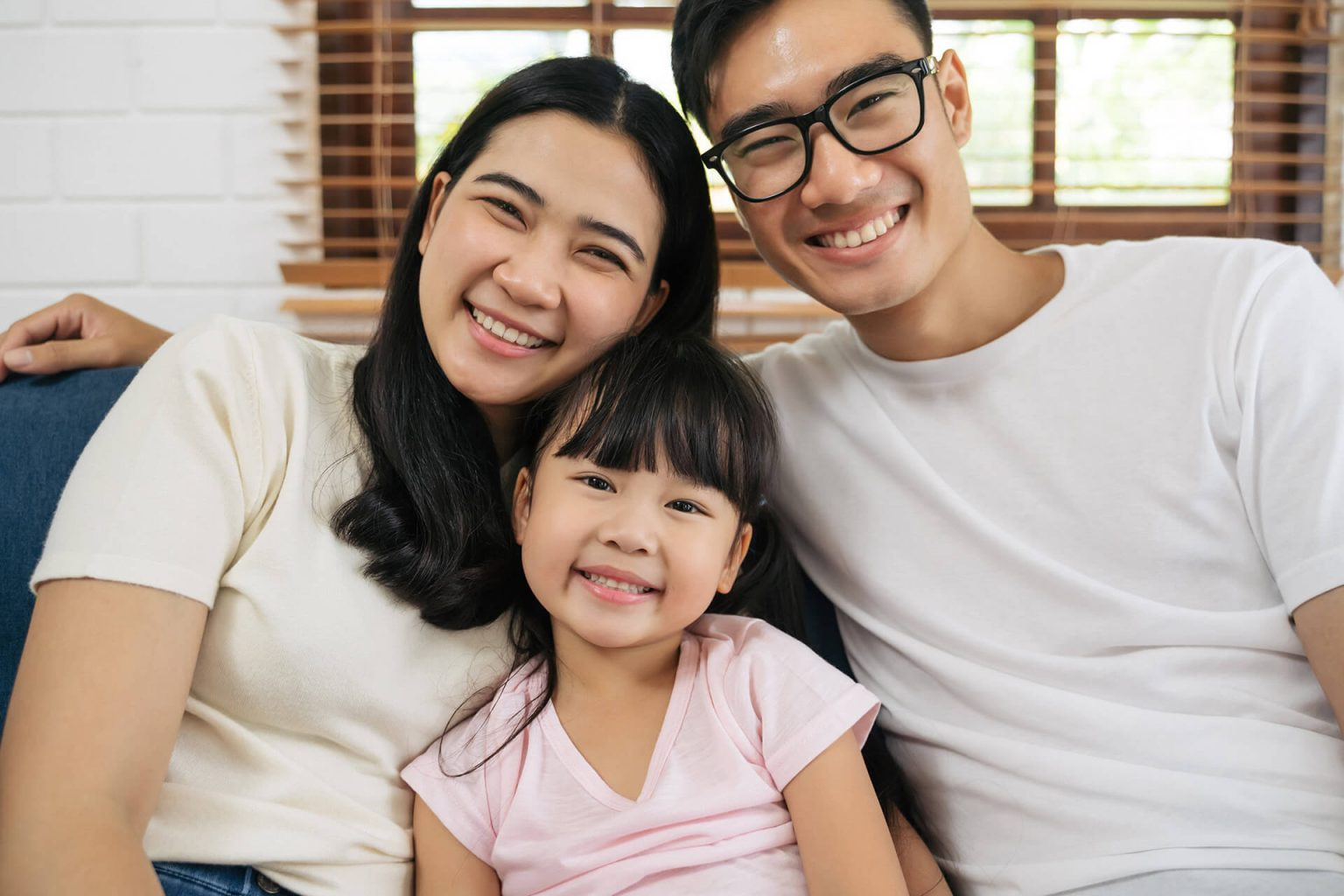Happy family protected by life insurance